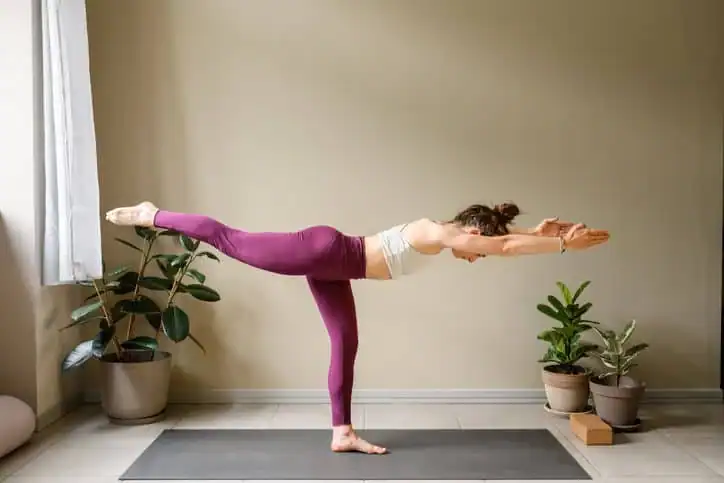 Achieving the Perfect Tone: How Often Should You Exercise for Results? 1 Woman doing Yoga exercise Stowmarket to help with toning the body.